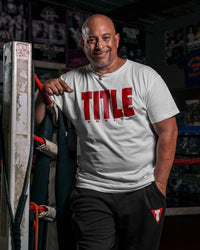 variant:White/Red::TITLE Boxing Iconic Block Tee man posing in tee