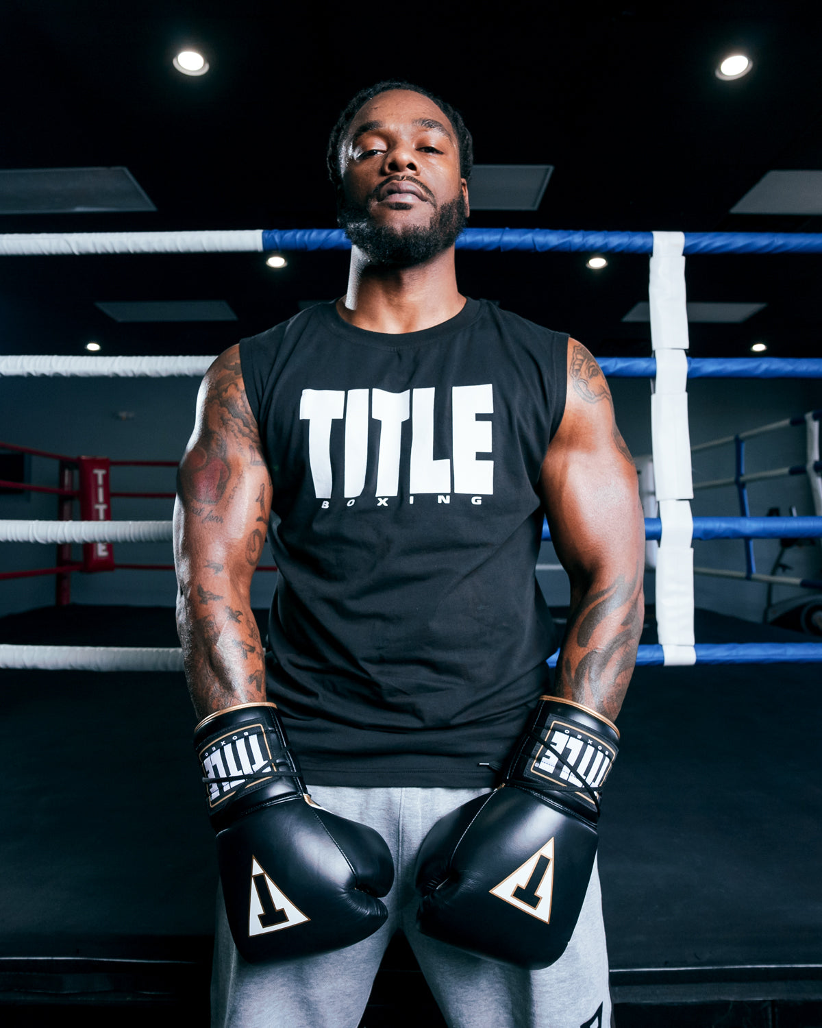 variant:Black/White::TITLE Boxing Iconic Block Muscle Tee man posing in tee