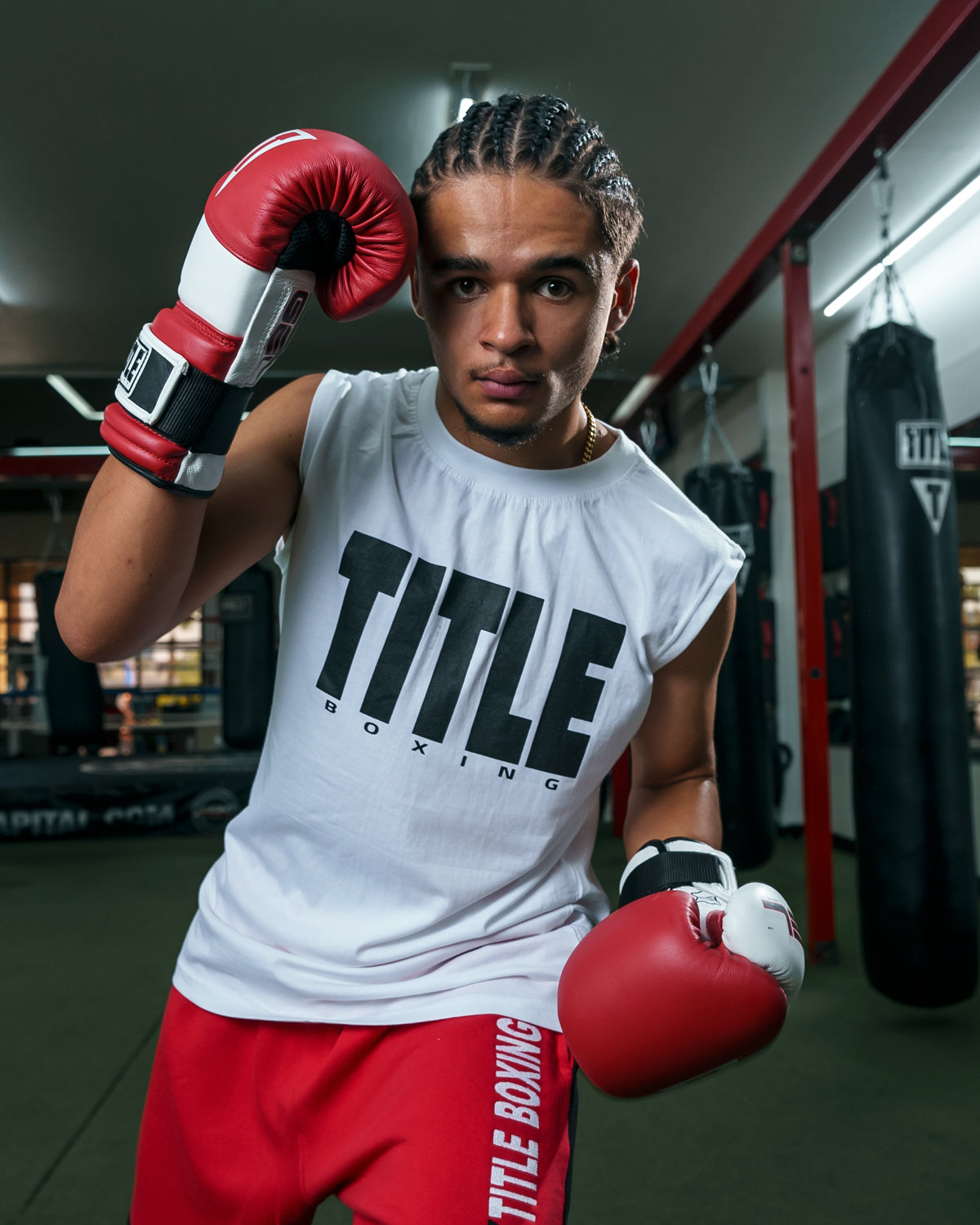 variant:White::TITLE Boxing Iconic Block Muscle Tee guy posing in tee