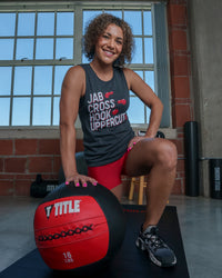 variant:lifestyle::TITLE Boxing Jab Cross Women's Muscle Tee