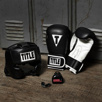 variant:black/white::TITLE Boxing Leather Sparring Bundle gym view