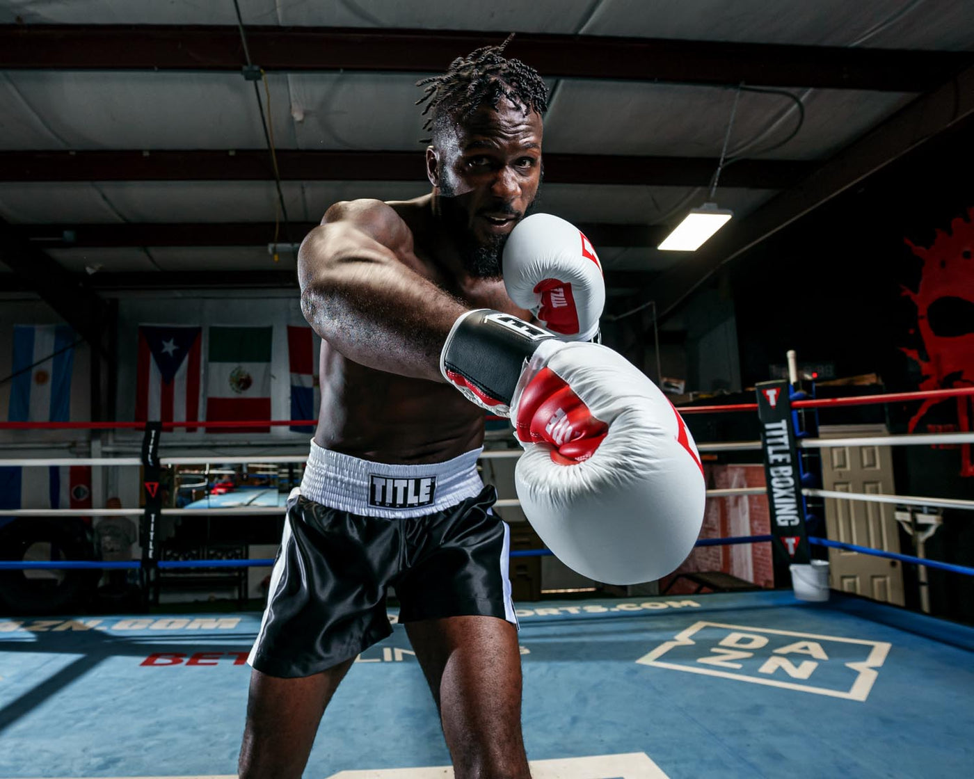 variant:black/white::TITLE Boxing Professional Traditional Cut Trunks right jab