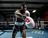 variant:black/white::TITLE Boxing Professional Traditional Cut Trunks right jab