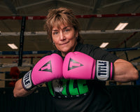 variant:Hot Pink/White::TITLE Premier Leather Super Bag Gloves 2.0 woman posing in gloves