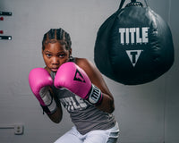 variant:Hot Pink/White::TITLE Premier Leather Super Bag Gloves 2.0 girl posing in gloves