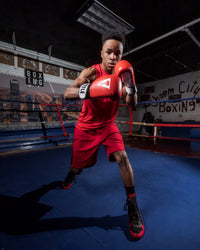 variant:Red/White::TITLE Premier Leather Super Bag Gloves 2.0 boy posing in ring