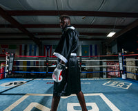 variant:black/white::TITLE Boxing Stock Full Length Robe 3.0 guy in ring turning around