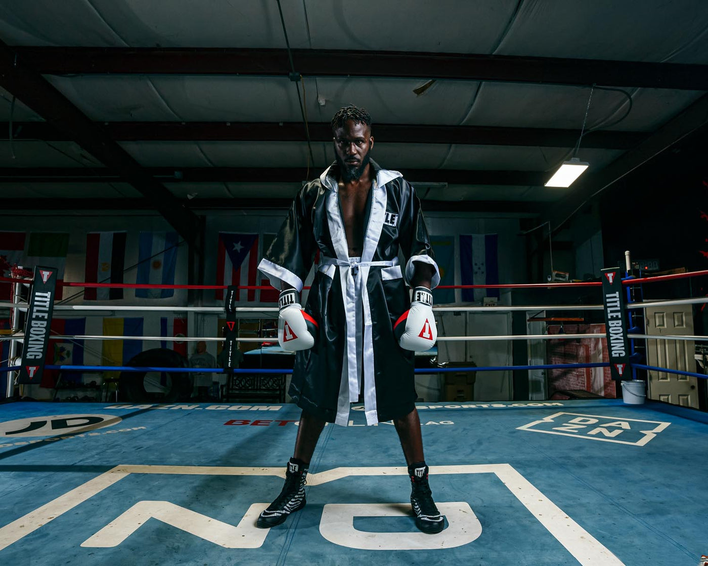variant:black/white::TITLE Boxing Stock Full Length Robe 3.0 guy in ring