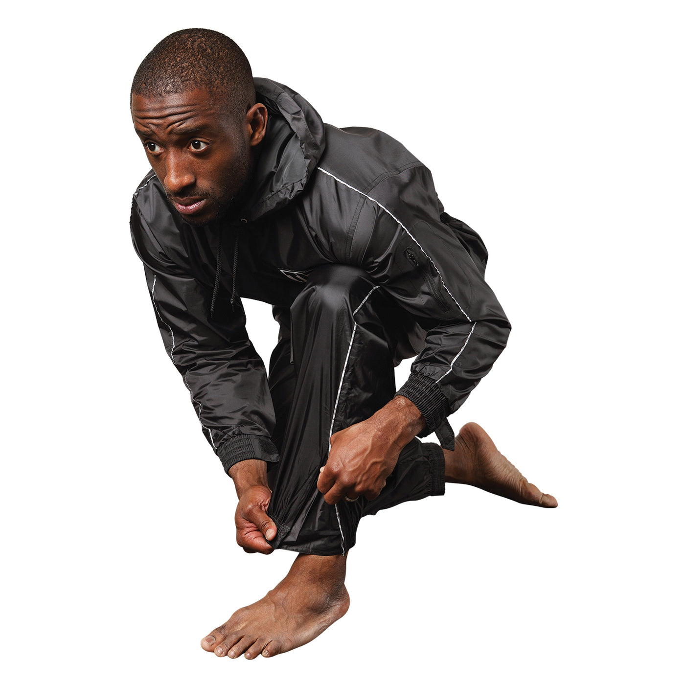 variant:lifestyle::TITLE Boxing Sauna Suit With Hood guy posing wearing sauna suit showing detail on legs