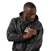 variant:lifestyle::TITLE Boxing Sauna Suit With Hood guy wearing sauna suit putting phone in pocket on sleeve