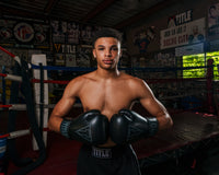 variant:Black::TITLE Boxing Vegan Fitness Bag Gloves man posing in gloves