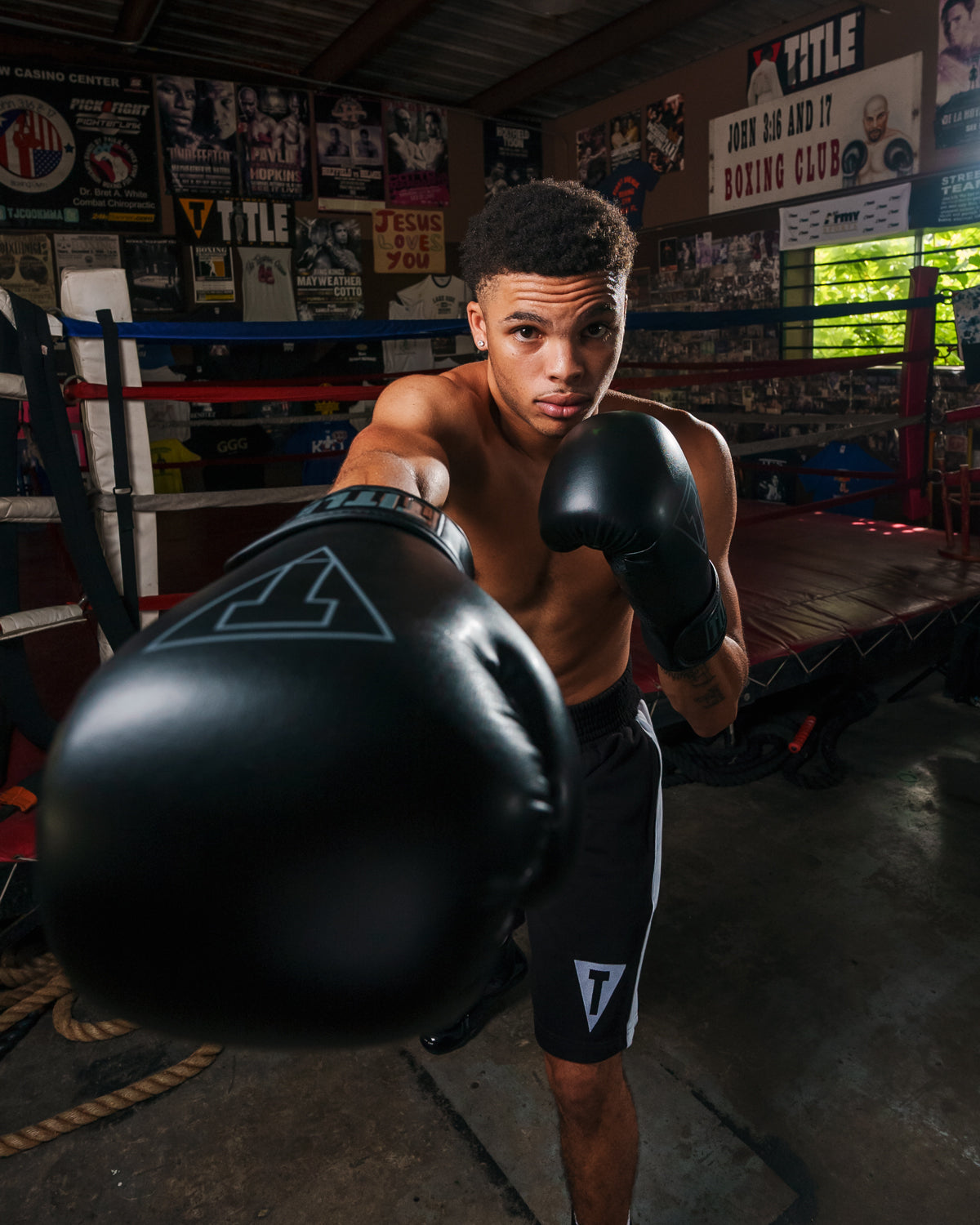 variant:Black::TITLE Boxing Vegan Fitness Bag Gloves man punching with gloves