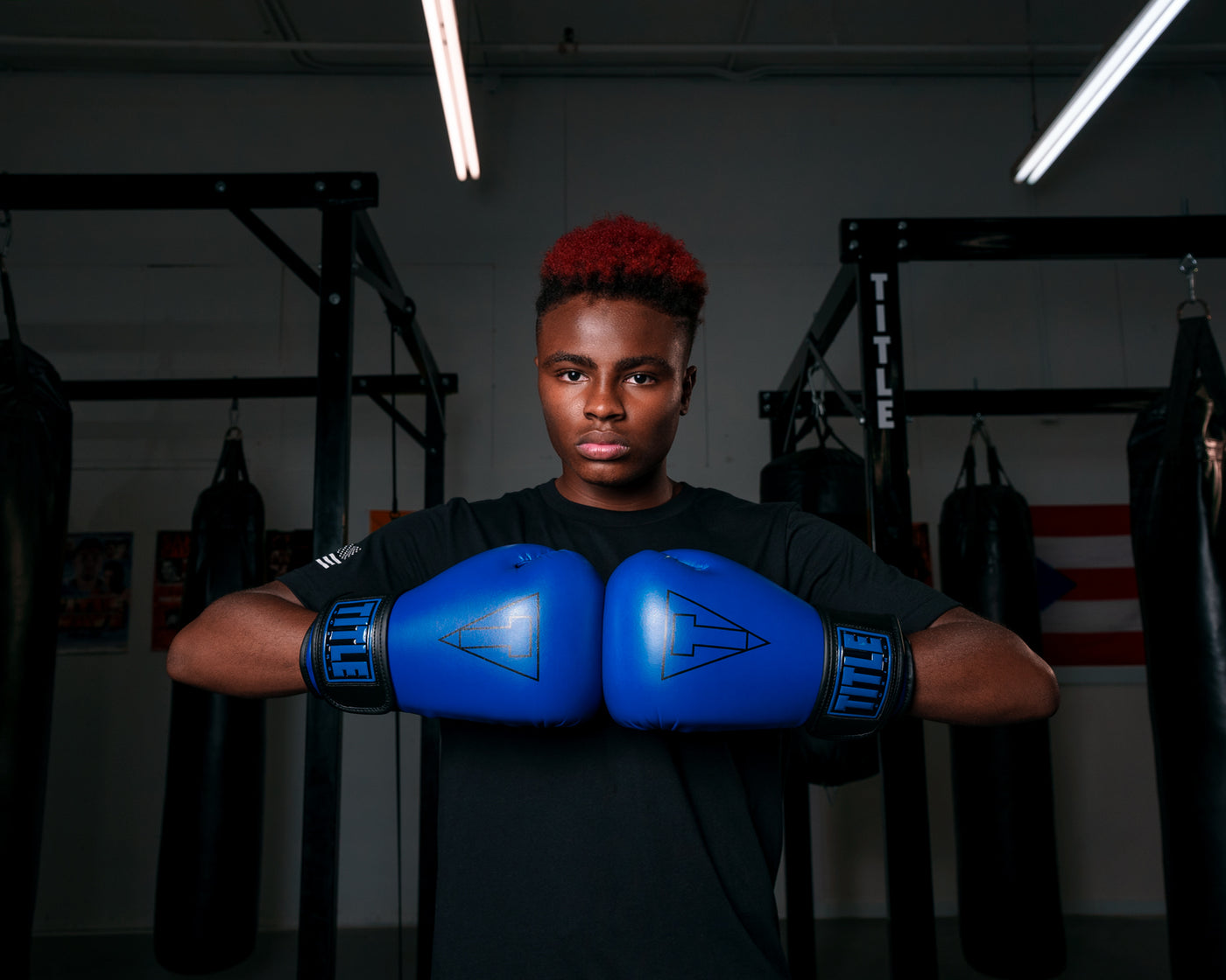 variant:Blue/Black::TITLE Boxing Vegan Fitness Bag Gloves man wearing gloves