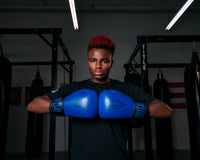 variant:Blue/Black::TITLE Boxing Vegan Fitness Bag Gloves man wearing gloves