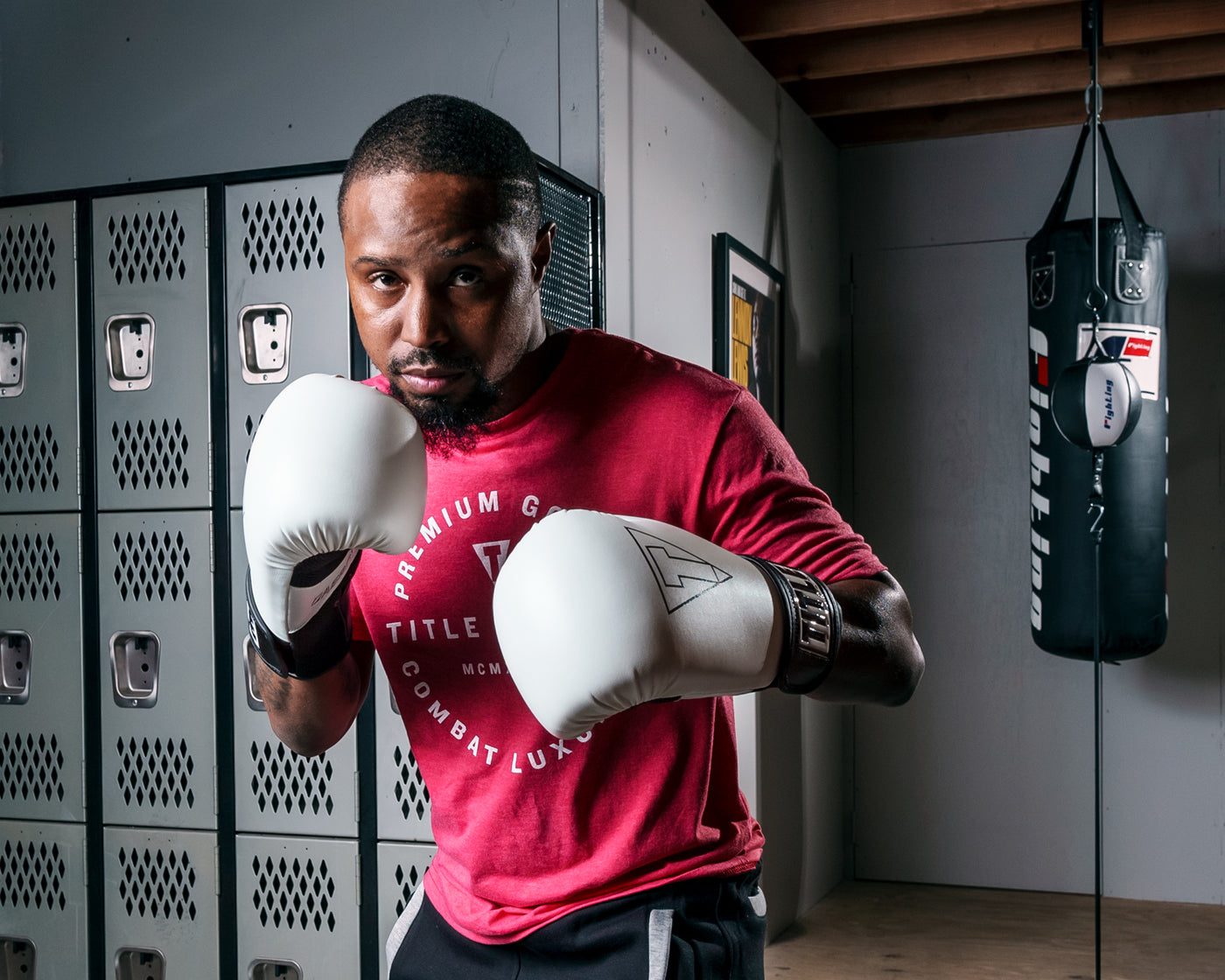 variant:White/Black::TITLE Boxing Vegan Fitness Bag Gloves man posing in gloves