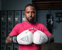 variant:White/Black::TITLE Boxing Vegan Fitness Bag Gloves man posing in gloves