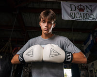 variant:White/Black::TITLE Boxing Vegan Fitness Bag Gloves man wearing gloves