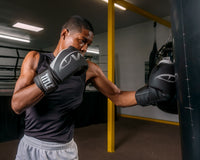 variant:Black/White::Viper by TITLE Boxing Strike Bag Gloves 2.0 man punching bag