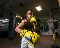variant:Black/Neon Yellow::Viper by TITLE Boxing Strike Select Bag Gloves 2.0 man posing in gloves
