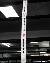variant:white::TITLE Boxing Two-Sided Rope Spacers image showing white rope spacer on ropes