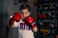 variant:Red/Black::TITLE Boxing Youth Bag Gloves youth posing with gloves