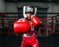 variant:black::TITLE Boxing Aerovent Elite USA Boxing Competition Headgear – Open Face kid throwing punch right punch