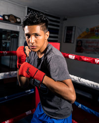 variant:red/black::TITLE Boxing Attack Nitro Speed Wraps 2.0 kid posing 