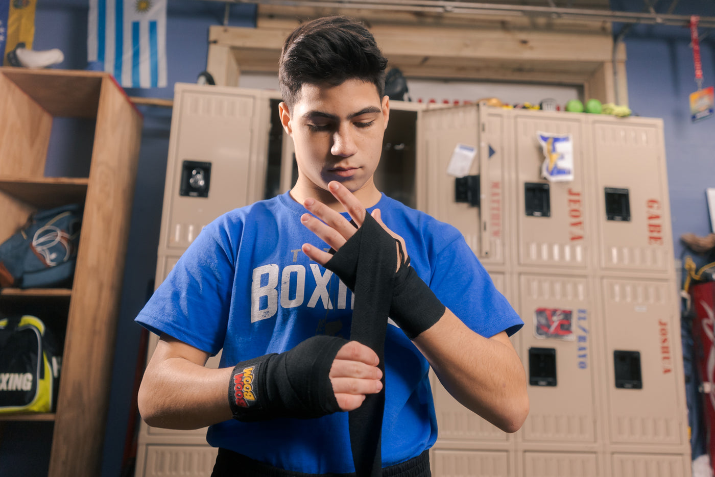 variant:Black::BOOM BOOM Boxing Youth Flex Hand Wraps kid putting on wrap