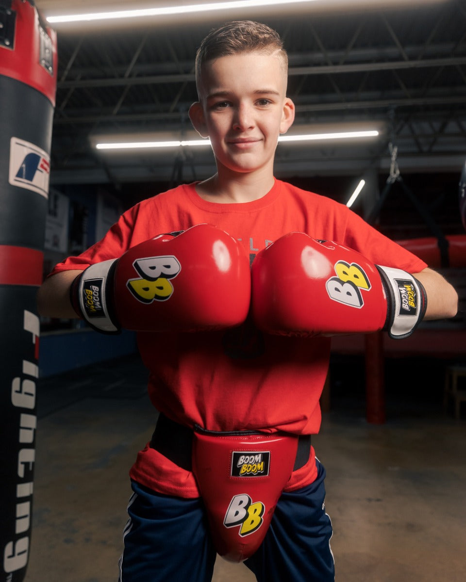 variant:lifestyle::BOOM BOOM Boxing Battle Youth Groin Protector kid wearing protector 