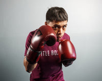 variant:lifestyle::TITLE Boxing Blood Red Leather Bag Gloves guy boxing stance pose