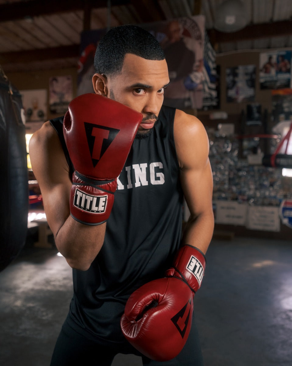 variant:lifestyle::TITLE Boxing Blood Red Leather Sparring Gloves guy posing 