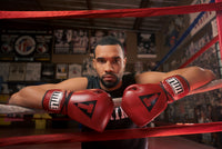 variant:lifestyle::TITLE Boxing Blood Red Leather Sparring Gloves guy on ring ropes