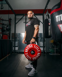 variant:lifestyle::TITLE Boxing Combination Punch Shield coach holding down to his knee