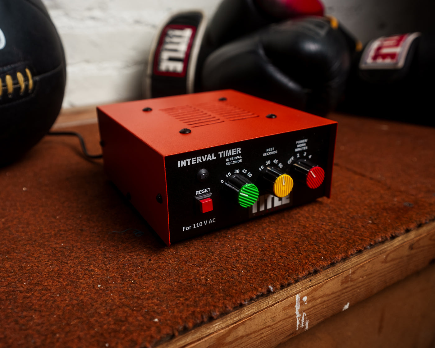 variant:lifestyle::TITLE Classic Personal Interval Timer on a shelf in a boxing gym