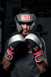 variant:lifestyle::TITLE Classic Power Air Headgear 2.0 guy in boxing stance 