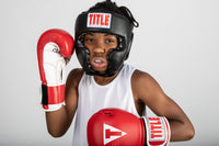 variant:lifestyle::TITLE Classic Traditional Training Headgear 2.0 boxing stance