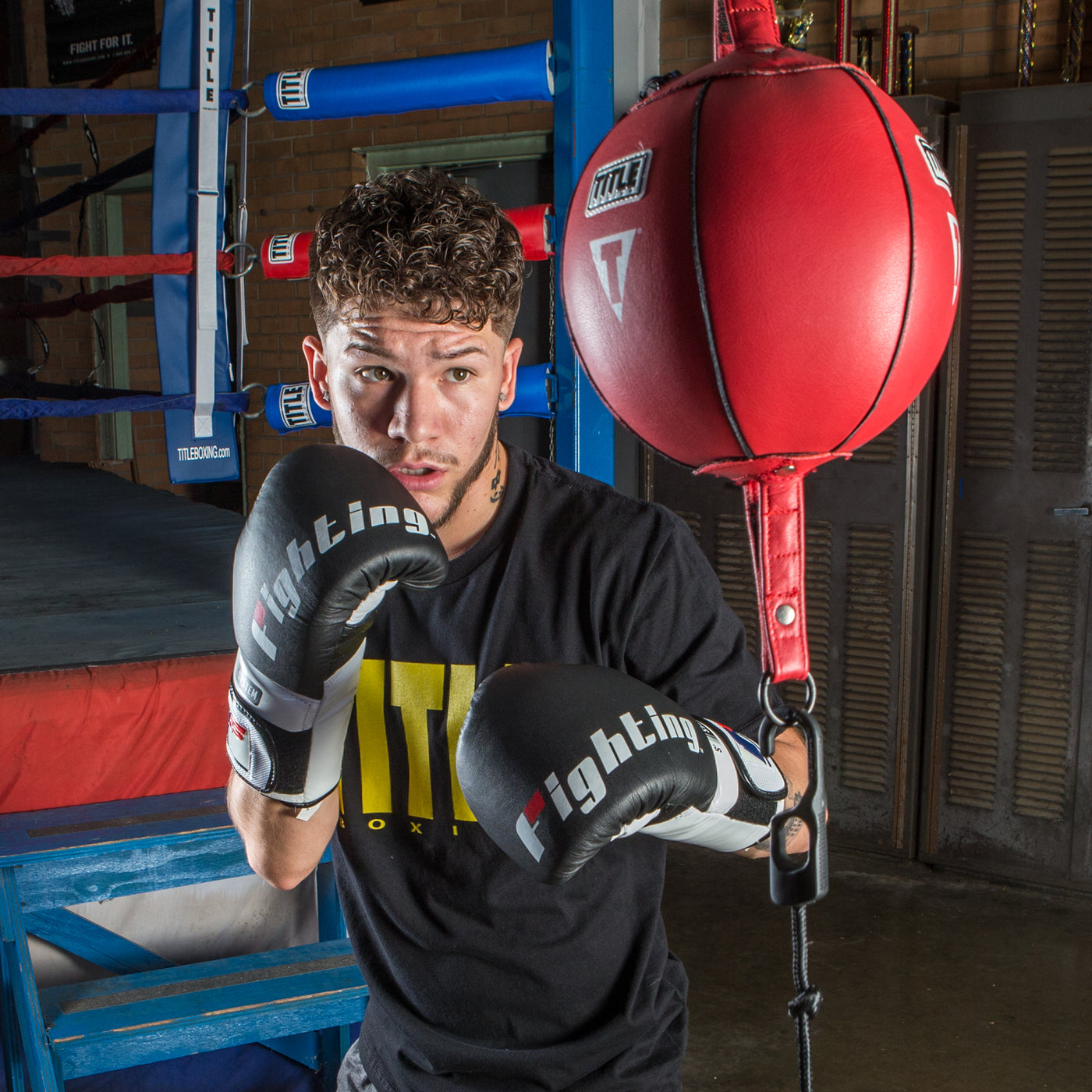 variant:7"::TITLE Boxing Double End Bag kid hitting double end bag