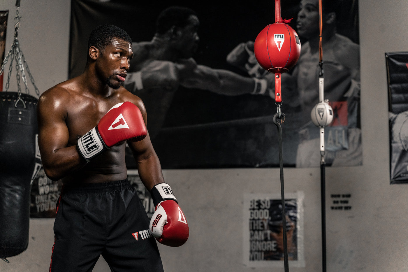 variant:7"::TITLE Boxing Double End Bag guy facing off with double end bag