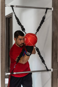 variant:lifestyle::TITLE Boxing Doorway Bag Rudy in doorway