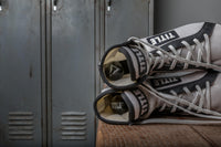 variant:lifestyle::TITLE Boxing Equipment Deodorizer Balls in use in a pair of boxing shoes