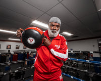 variant:black/red::TITLE Boxing Fighting Fresh Punch Shield guy posing with punch shield