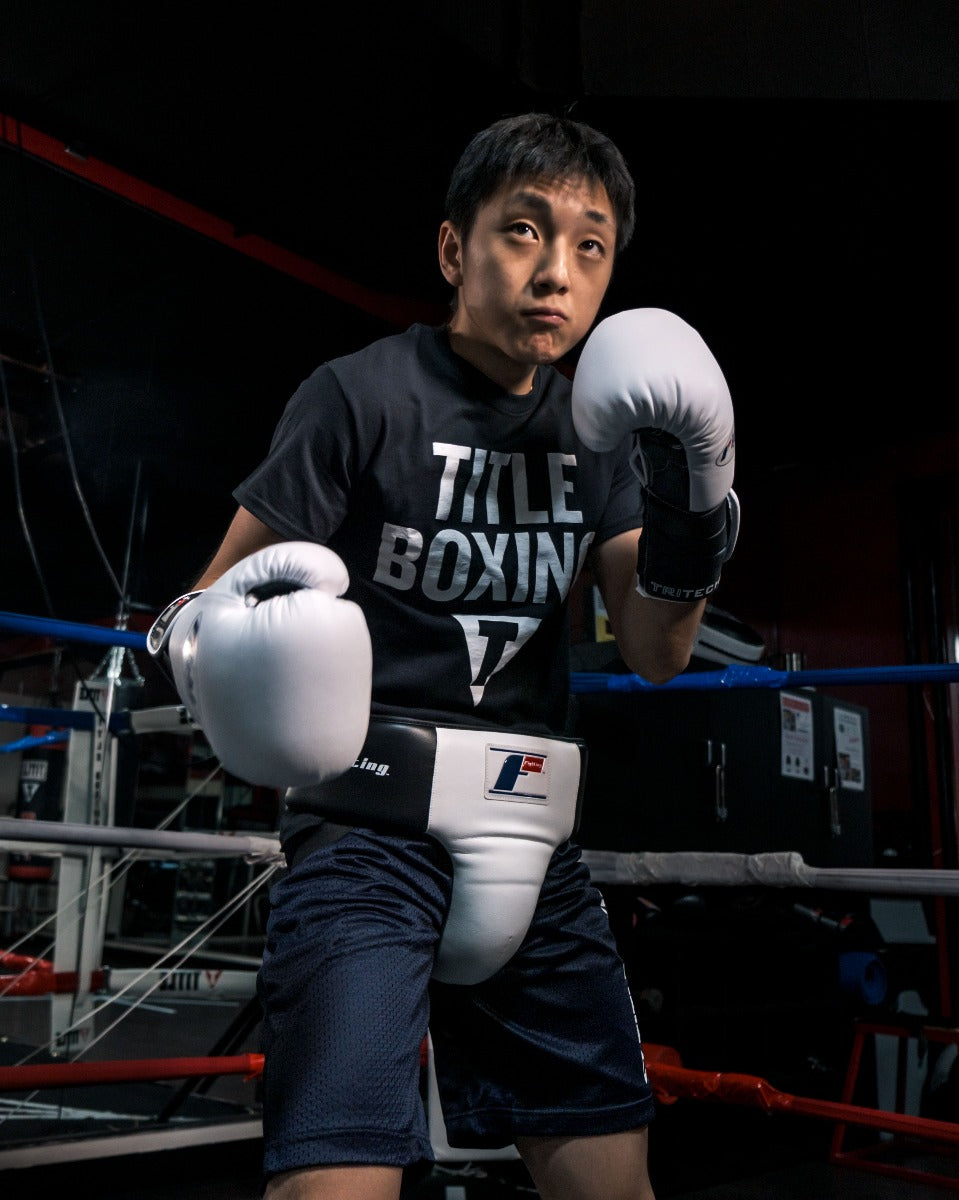 variant:lifestyle::Fighting Deluxe Groin & Ab Protector 2.0 guy posing in groin protector