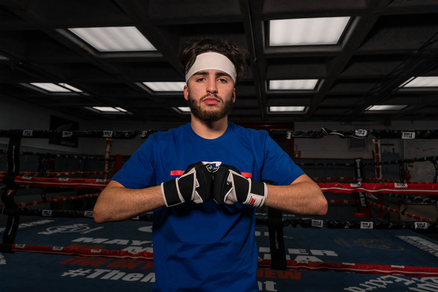 variant:lifestyle::Fighting S2 Pro GEL Glove Wraps guy wearing glove wraps
