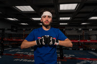 variant:lifestyle::Fighting S2 Pro GEL Glove Wraps guy wearing glove wraps