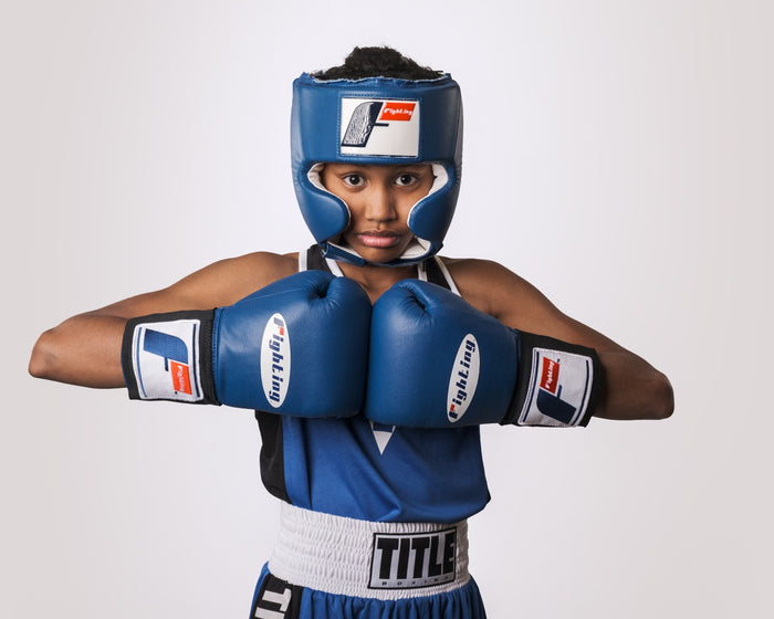 variant:Blue::Fighting USA Boxing Competition Headgear with Cheeks child posing in headgear