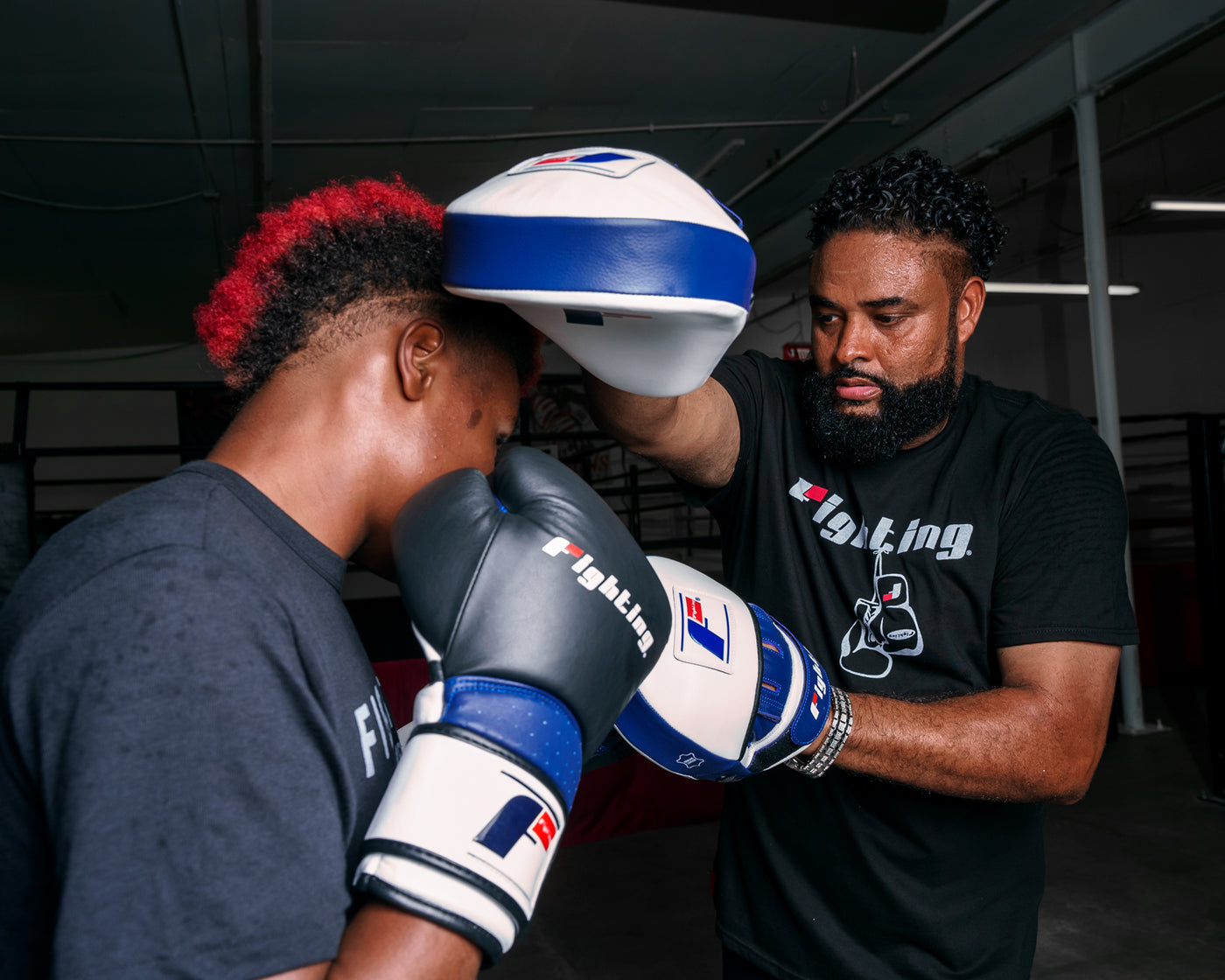 variant:lifestyle::Fighting Force Leather Punch Mitts coach and boxer mitting