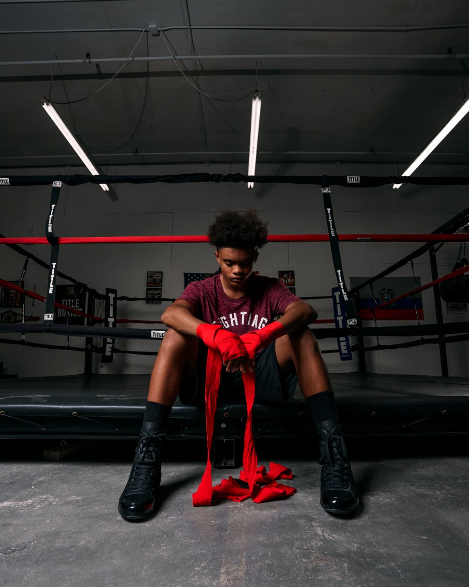 variant:red/blue::Fighting 180” Semi Elastic Hand Wrap boy sitting hands own