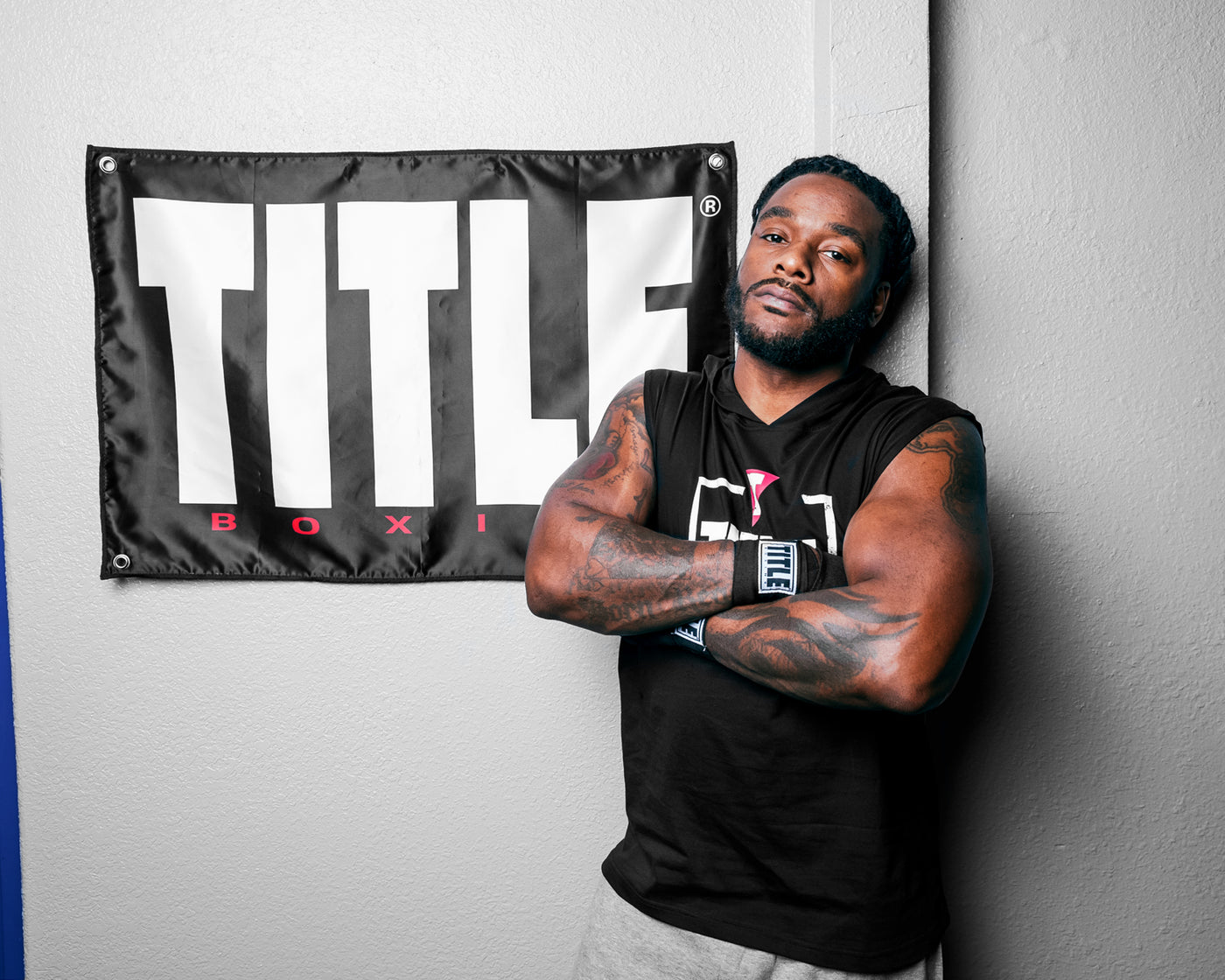 variant:lifestyle::TITLE Boxing Big Logo Banner on the wall of a boxing gym