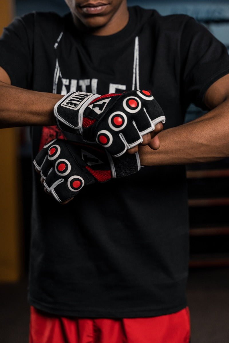variant:lifestyle::TITLE Boxing Gel Rage Fist Wrap Gloves close up on gloves