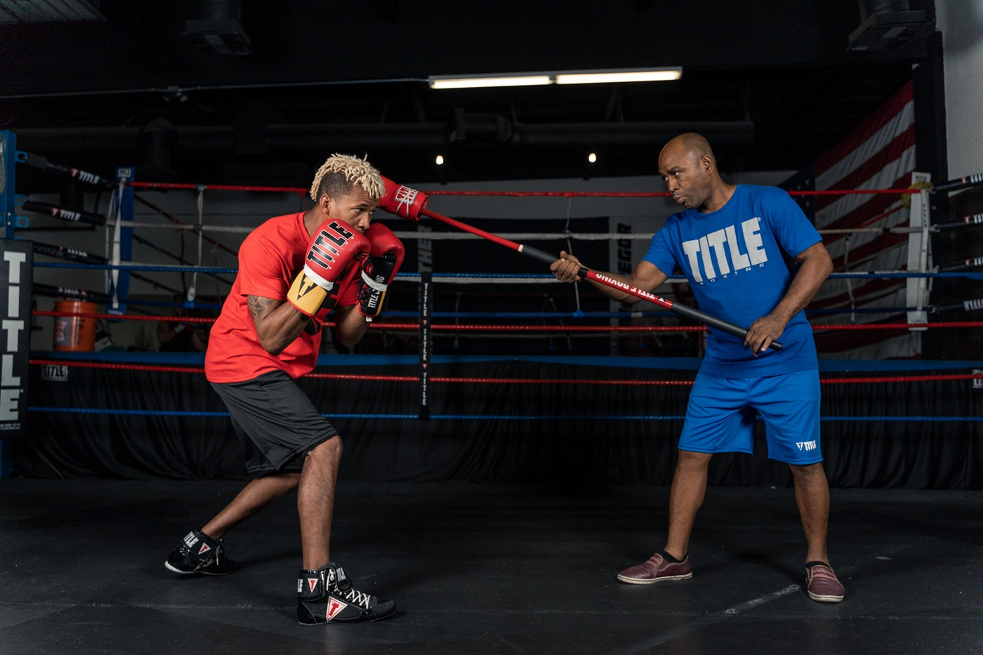 variant:lifestyle::TITLE Boxing Gladiator Stick in use in a boxing gym
